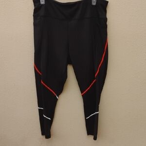 Black Leggings with Orange and White Accents